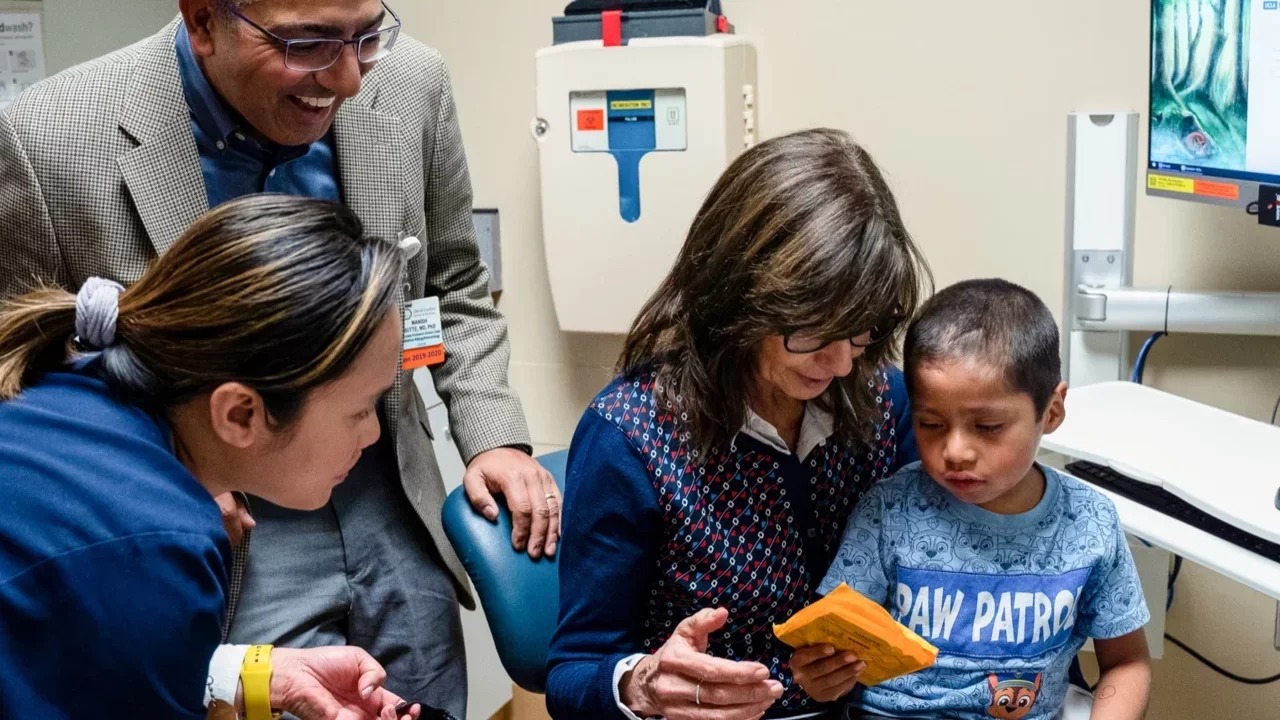 Child patient working with doctor