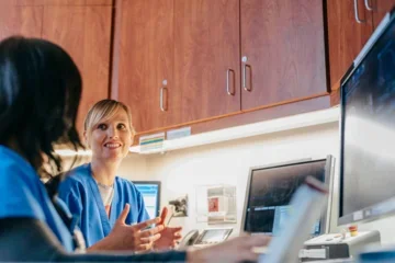 Faculty members in conversation