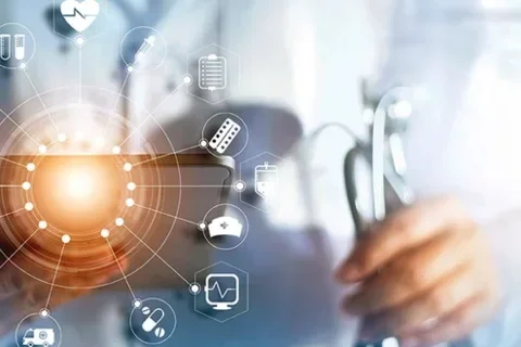 Stylized image of clinician holding stethoscope and grid of medical informatics tools.