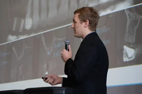 Carson Hunt presenting research