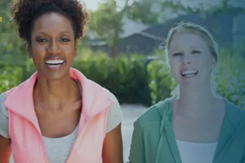 Two people jogging together