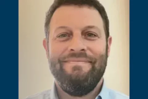 Headshot of Aaron Alexander-Bloch