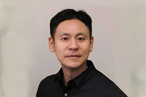 Dr. Min Lee against a tab background