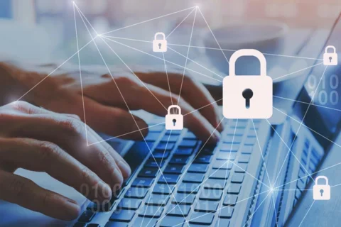 Hands typing on keyboard