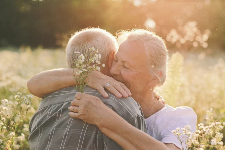caucasian couple hugging