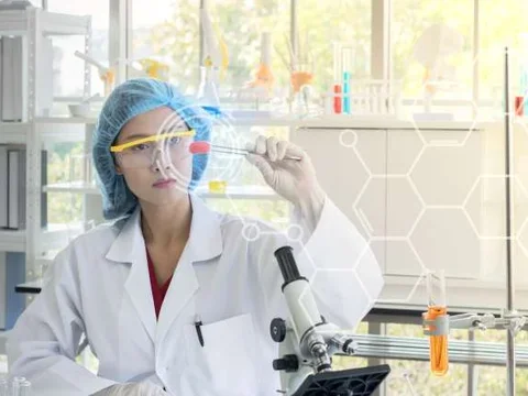 Researcher holding test tube