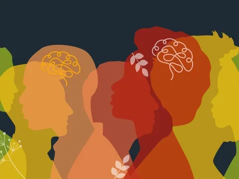 Multicolored overlapping human profiles with brain and gear icons