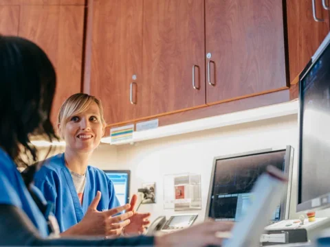 Faculty members in conversation