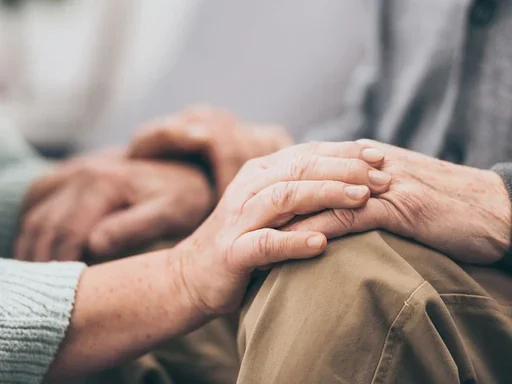 Lewy Body Dementia (LBD) Caregiver Support Group Elderly Person Being Comforted